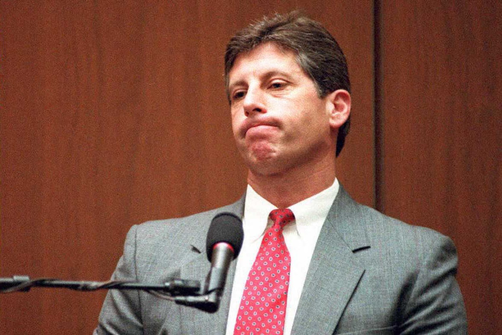 Los Angeles Police detective Mark Fuhrman listens to a question from defense attorney F. Lee Bailey in the OJ Simpson double murder trial in Los Angeles. (KEN LUBAS/POOL/AFP via Getty Images)