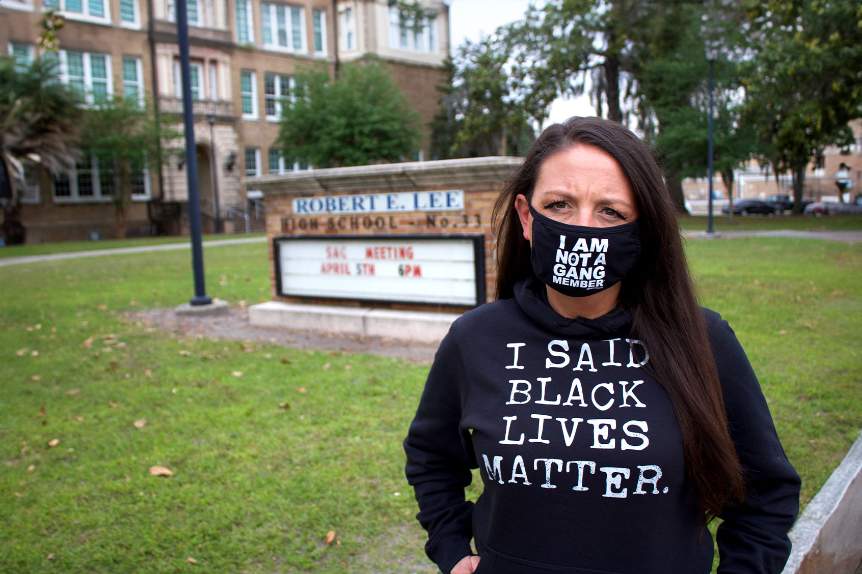 Amy Donofrio in front of Robert E. Lee High School (Photo courtesy of the EVAC movement)