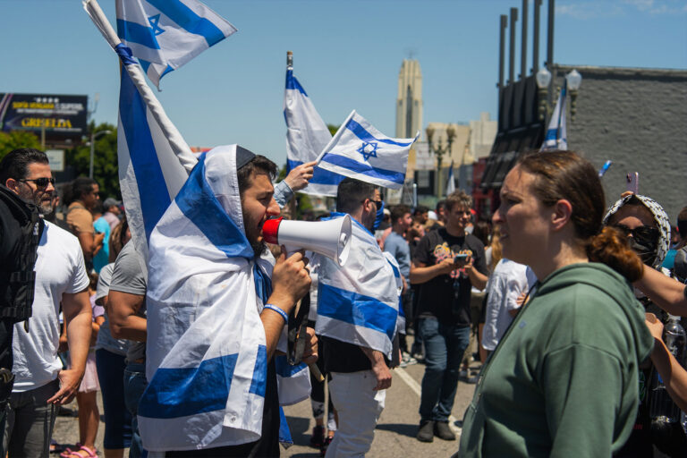 Pro-Israel protesters and Pro-Palestine protesters face off outside of the Adas Torah Orthodox Jewish synagogue in Los Angeles, June 23, 2024. (Shay Horse/NurPhoto via Getty Images)