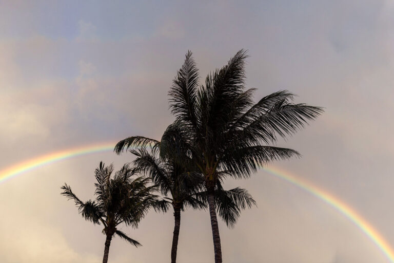 A rainbow is seen from the hotel where Val and Kali Casco have been staying near Lahaina, HI, on Aug. 29, 2023. (Tamir Kalifa for The Washington Post via Getty Images)