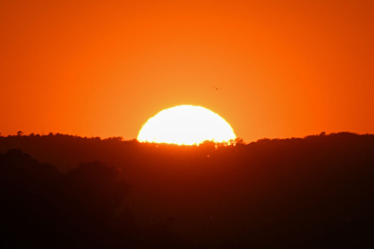 Sun sets over the San Francisco International Airport (SFO) on May 8, 2024 in San Francisco, California, United States as the Bay Area is going to see this week its warmest temps since last October. (Tayfun Coskun/Anadolu via Getty Images)
