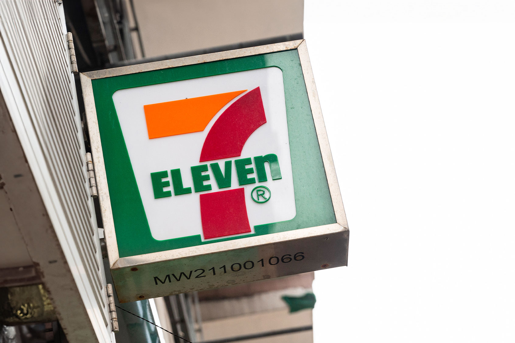 Company logo sign from the Japanese-owned American international chain of convenience, 7-Eleven, seen outside its store in Hong Kong. (Sebastian Ng/SOPA Images/LightRocket via Getty Images)