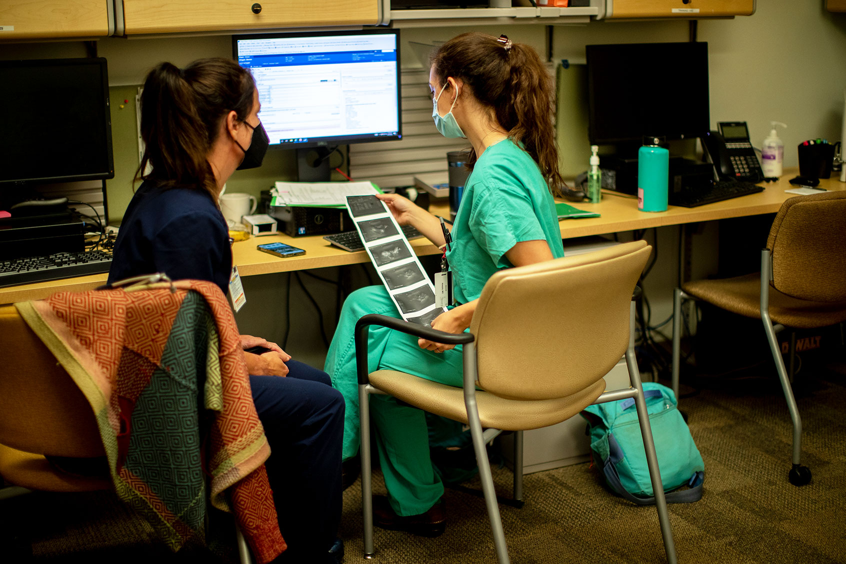 A family physician and her resident look over an ultrasound the day before the Supreme Court overturned Roe v. Wade at the Center for Reproductive Health clinic on June 23, 2022 in Albuquerque, New Mexico. (Gina Ferazzi / Los Angeles Times via Getty Images)