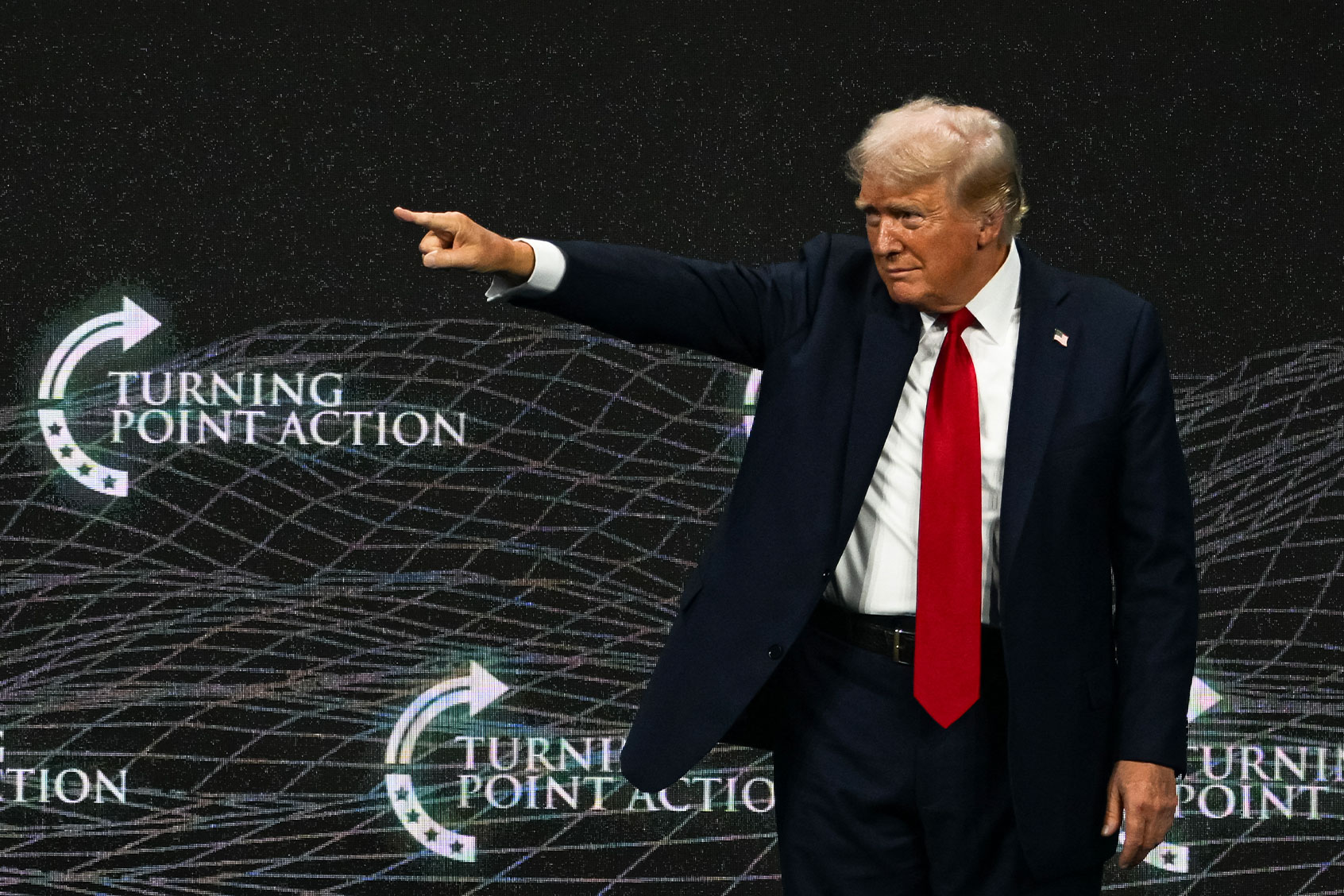 Former US President and 2024 Republican presidential candidate Donald Trump gestures after speaking at Turning Point Action's "The Believers Summit" in West Palm Beach, Florida, on July 26, 2024. (CHANDAN KHANNA/AFP via Getty Images)
