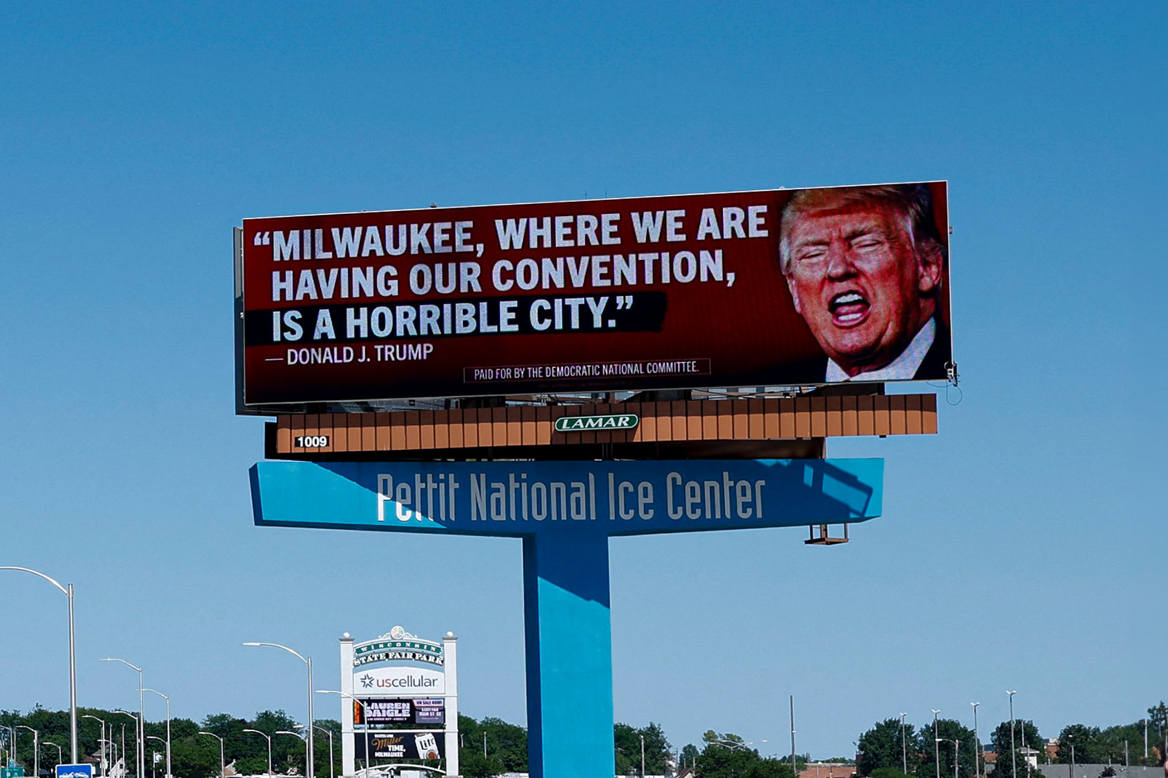 A billboard launched by the Democratic National Committee in 10 Milwaukee locations shows former US president and 2024 Republican presidential candidate Donald Trump criticizing the city that will host the Republican National Convention in July, in Milwaukee, Wisconsin, June 14, 2024. (KAMIL KRZACZYNSKI/AFP via Getty Images)