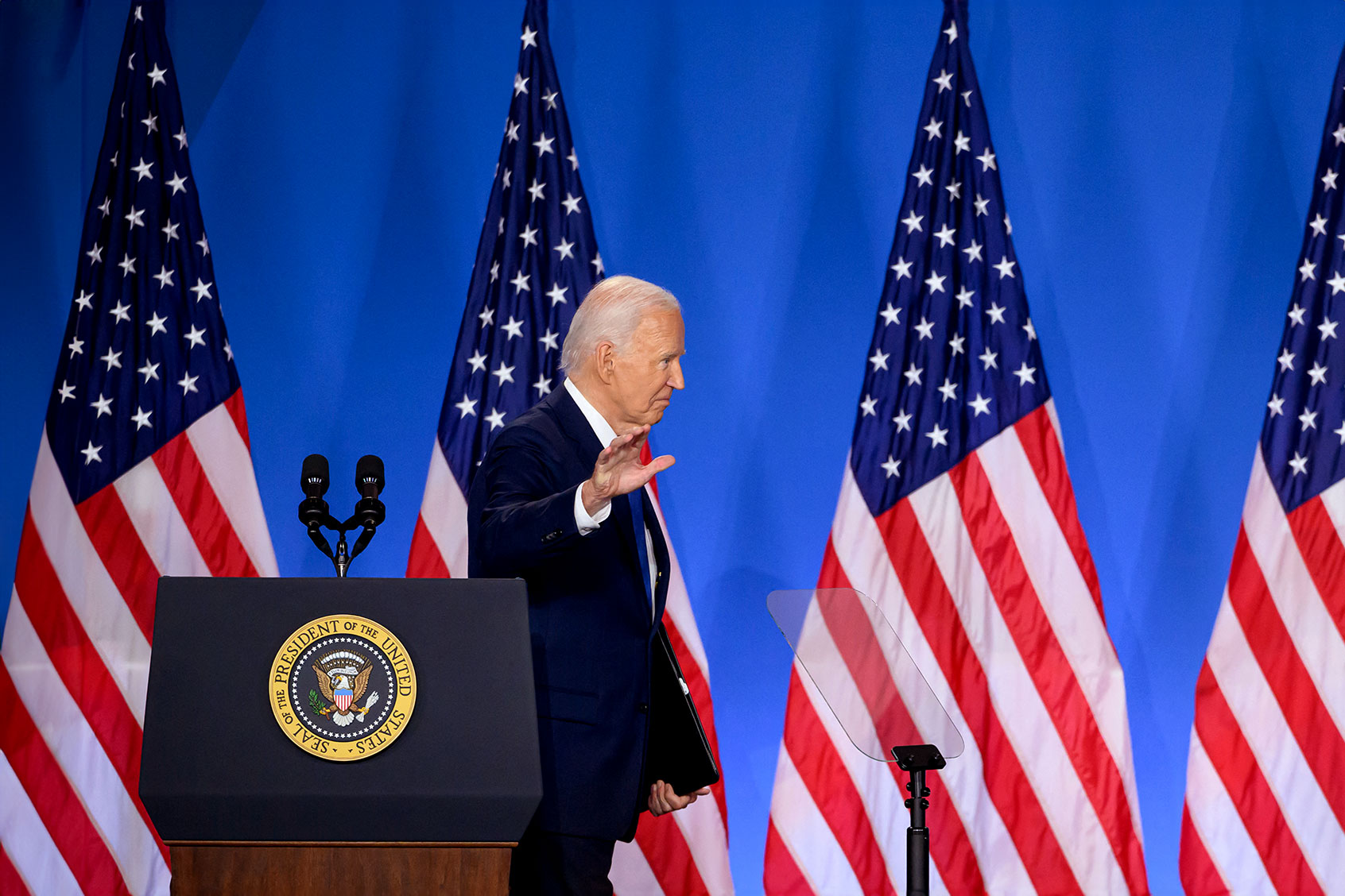 US President Joe Biden gestures as he leaves after speaking at a press conference at the close of the 75th NATO Summit at the Walter E. Washington Convention Center in Washington, DC on July 11, 2024. (MANDEL NGAN/AFP via Getty Images)