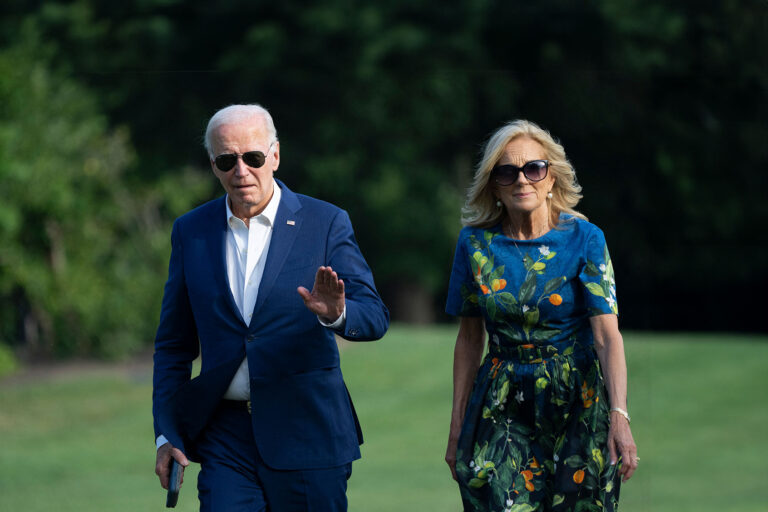US President Joe Biden and First lady Jill Biden walk to the White House in Washington, DC, on July 7, 2024, as they return after attending campaign events in Pennsylvania. (CHRIS KLEPONIS/AFP via Getty Images)