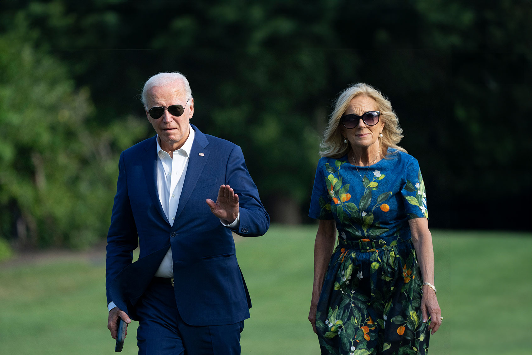 US President Joe Biden and First lady Jill Biden walk to the White House in Washington, DC, on July 7, 2024, as they return after attending campaign events in Pennsylvania. (CHRIS KLEPONIS/AFP via Getty Images)
