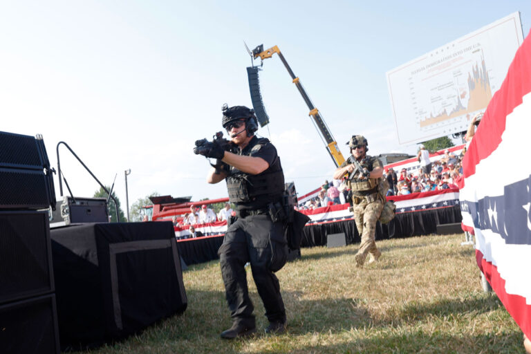 Law enforcement officers move during a Donald Trump rally on July 13, 2024 in Butler, Pennsylvania. (Anna Moneymaker/Getty Images)
