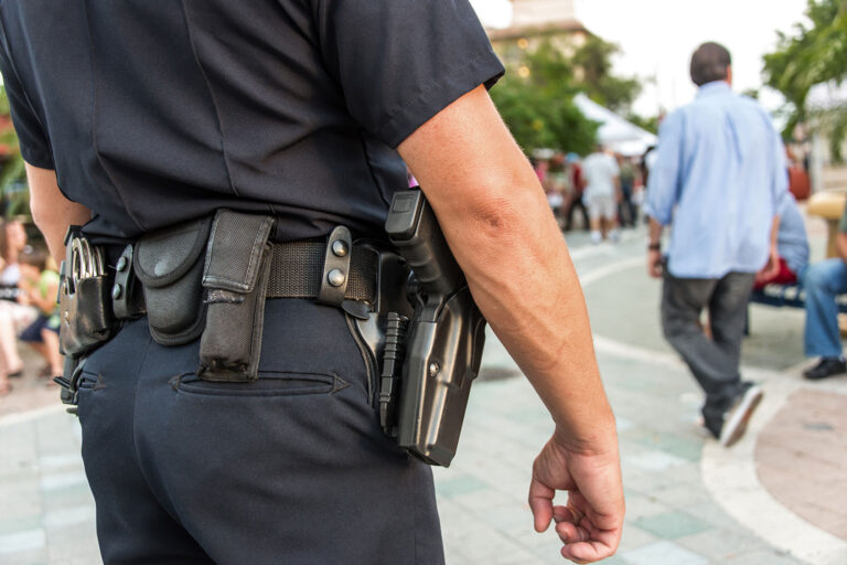 Police officer watching the streets (Getty Images/Juanmonino)