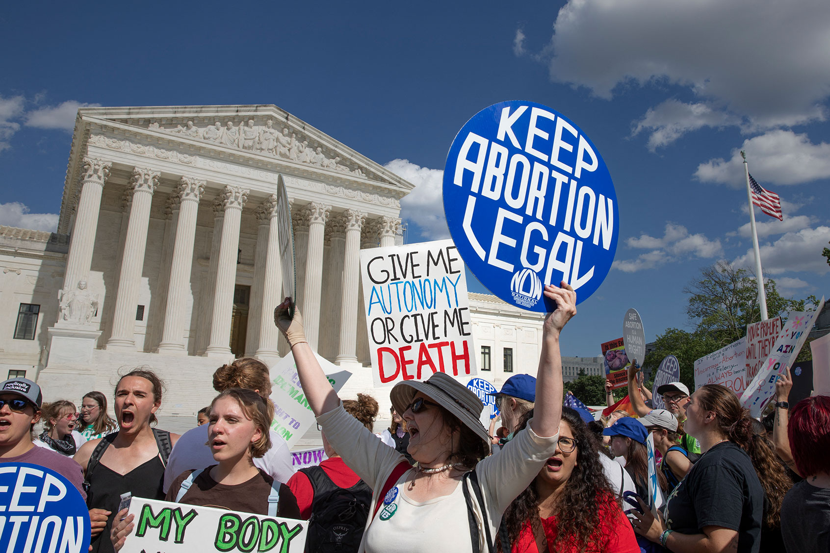 Women are showing signs when the abortion rights activists are protesting in front of the US Supreme Court in Washington, DC on June 24, 2024. (AASHISH KIPHAYET/Middle East Images/AFP via Getty Images)