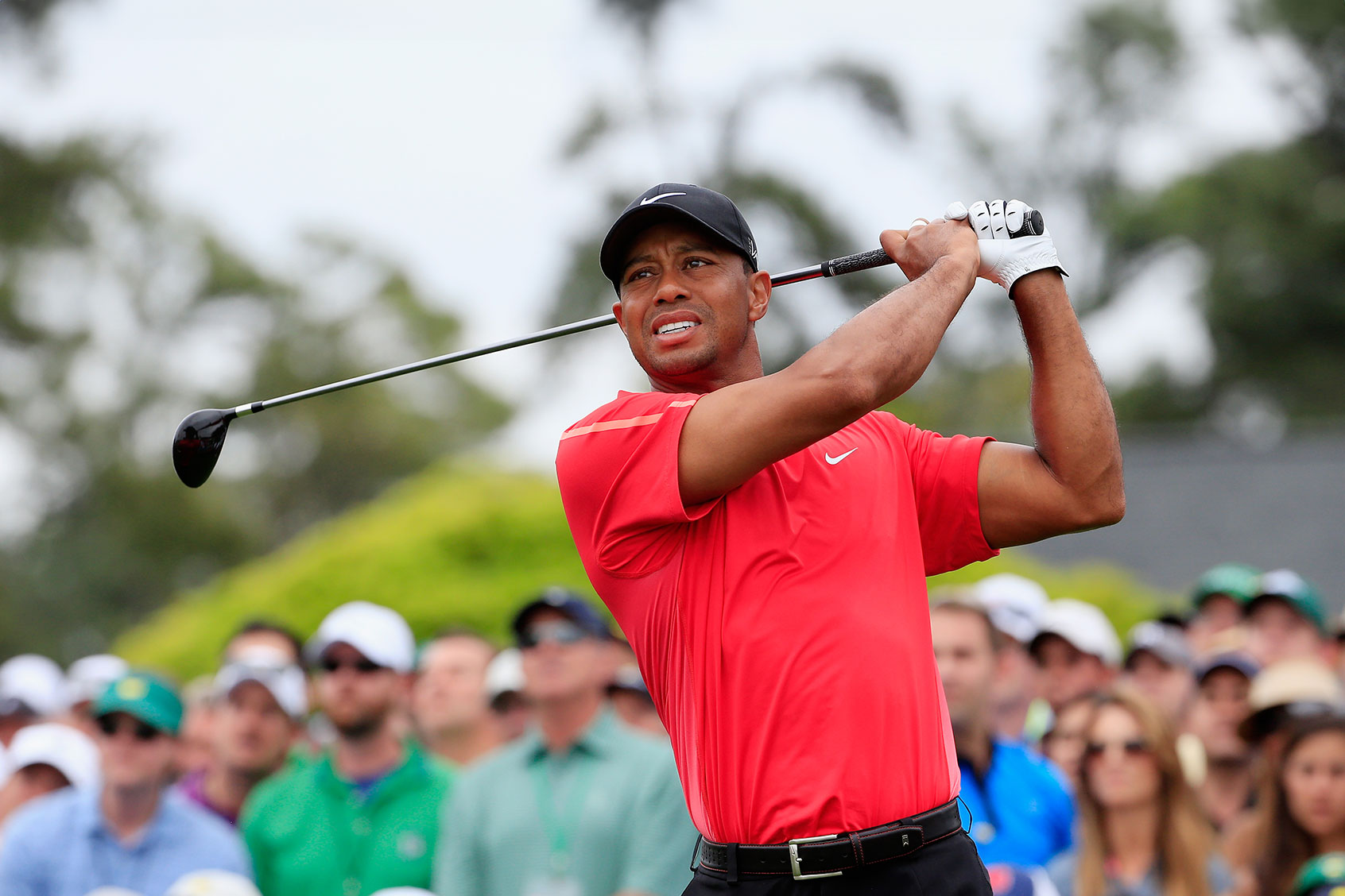 Tiger Woods watches his tee shot on the first hole during the final round of the 2015 Masters Tournament at Augusta National Golf Club on April 12, 2015 in Augusta, Georgia. (Jamie Squire/Getty Images)