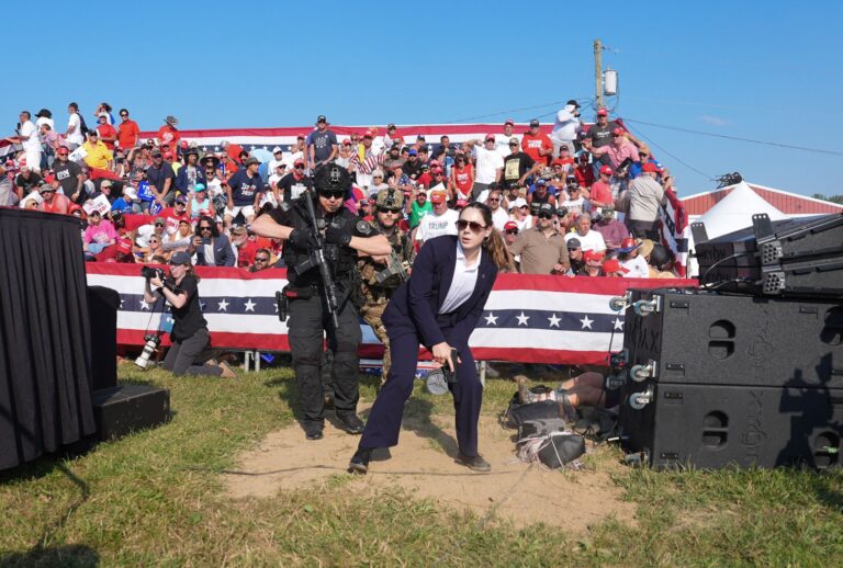 Secret service agents approach the stage during a campaign rally for former President Donald Trump at Butler Farm Show Inc. on Saturday, July 13, 2024 in Butler, Pa. (Jabin Botsford/The Washington Post via Getty Images)