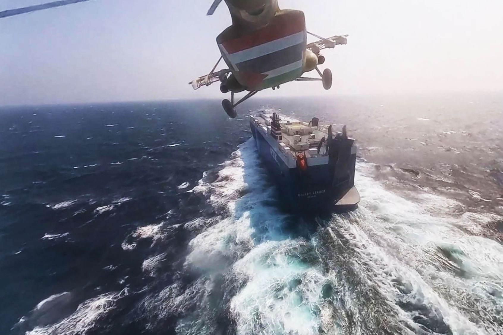 This handout screen grab captured from a video shows Yemen's Houthi fighters' takeover of the Galaxy Leader Cargo in the Red Sea coast off Hudaydah, on November 20, 2023 in the Red Sea, Yemen. (Houthi Movement via Getty Images)