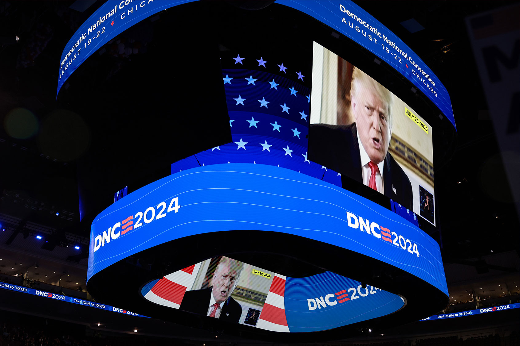 An image of Republican Presidential nominee, former president Donald Trump is displayed during the first day of the Democratic National Convention at the United Center on August 19, 2024 in Chicago, Illinois. (Joe Raedle/Getty Images)