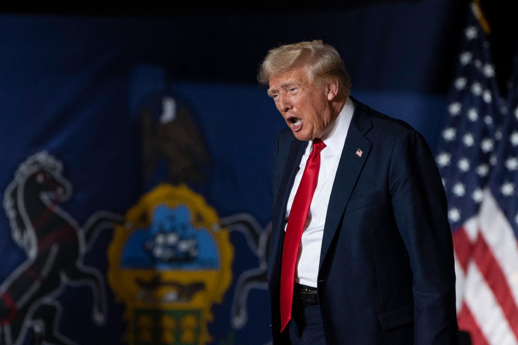 Former U.S. President and 2024 Republican presidential candidate Donald Trump reacts as he arrives at a campaign rally at the New Holland Arena in Harrisburg, Pennsylvania, on July 31, 2024. (JOE LAMBERTI/AFP via Getty Images)