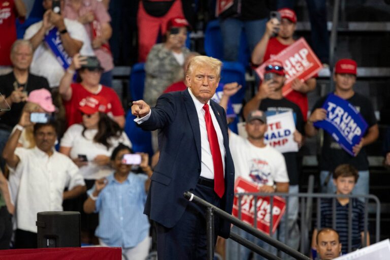 Former U.S. President and 2024 Republican presidential candidate Donald Trump points to the crowd as he leaves after speaking during a campaign rally at the Georgia State University Convocation Center in Atlanta, Georgia, on August 3, 2024. (CHRISTIAN MONTERROSA/AFP via Getty Images)