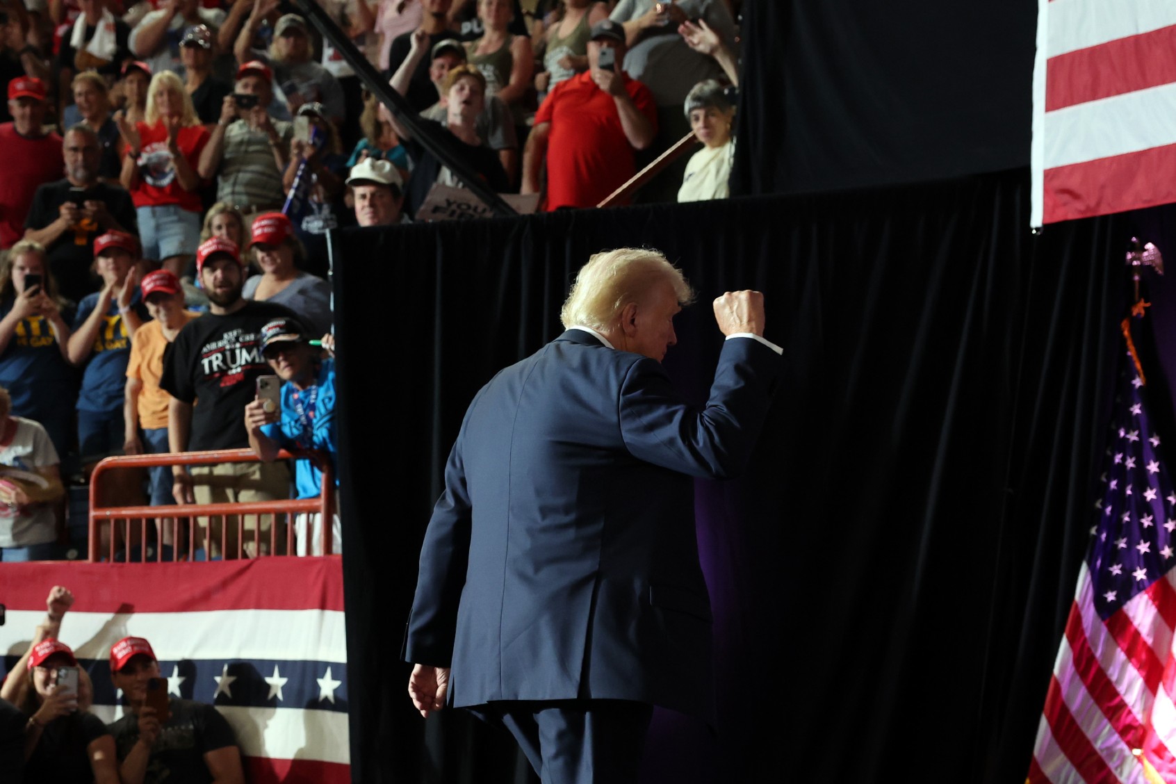 Former President Donald Trump walks off stage at a campaign appearance on July 31, 2024 in Harrisburg, Pennsylvania. (Spencer Platt/Getty Images)