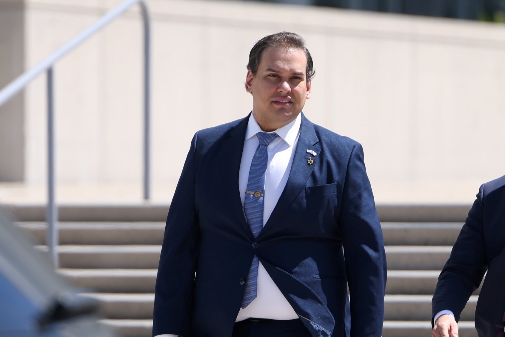 Former Long Island Congressman, George Santos, expelled by the House of Representatives, leaves the federal courthouse in Central Islip, New York, where he is on trial in a fraud case, on August 13, 2024. (James Carbone/Newsday RM via Getty Images)