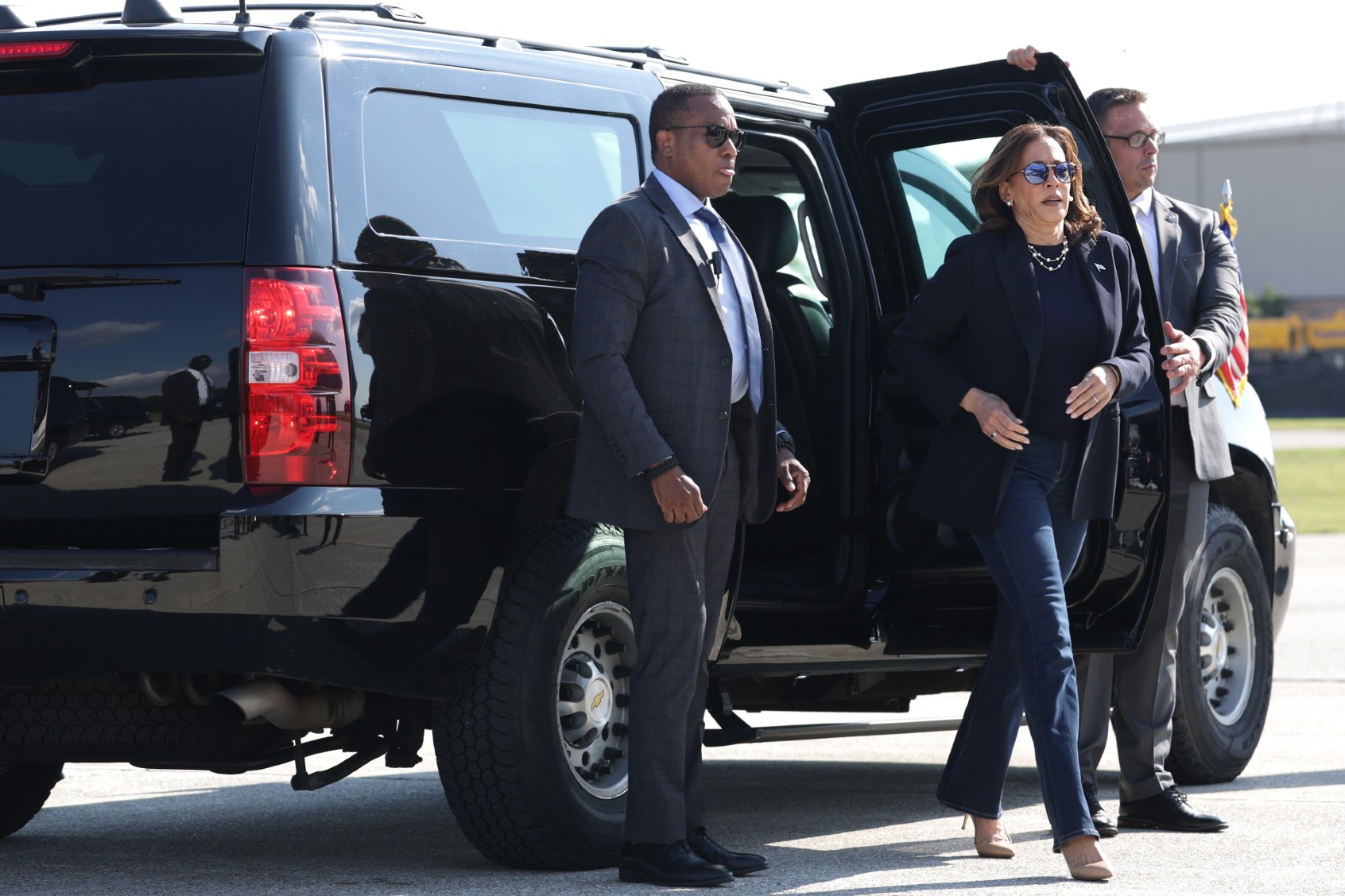Democratic U.S. presidential candidate Vice President Kamala Harris gets out of her vehicle for a departure at Detroit Metropolitan Wayne County Airport in Detroit, Michigan. (Alex Wong/Getty Images)