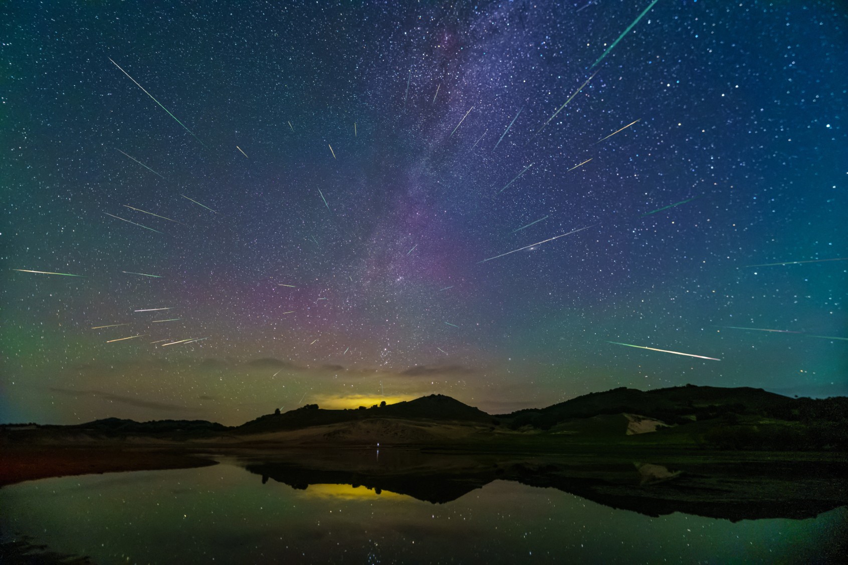 The Perseid meteor shower is seen over the Ulanbum grassland in Chifeng city, Inner Mongolia, China, August 14, 2023. (CFOTO/Future Publishing via Getty Images)
