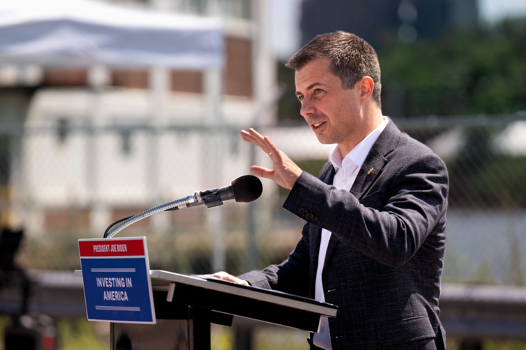 U.S. Transportation Secretary Pete Buttigieg speaks at the site of the former B&M Baked Beans plant on Wednesday, August 7, 2024. (Gregory Rec/Portland Press Herald via Getty Images)