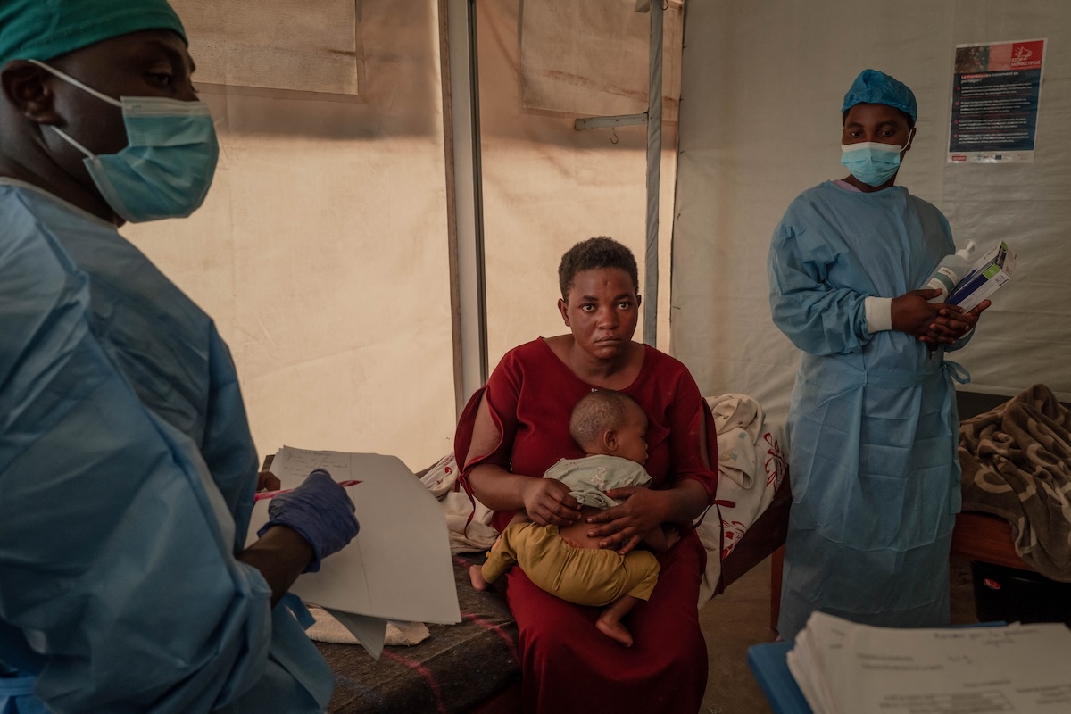 Health workers monitor Mpox patients at the Mpox treatment centre of the Nyiragongo general reference hospital, north of the city of Goma in the Democratic Republic of Congo, on August 16, 2024. (GUERCHOM NDEBO / Contributor (Getty Images))