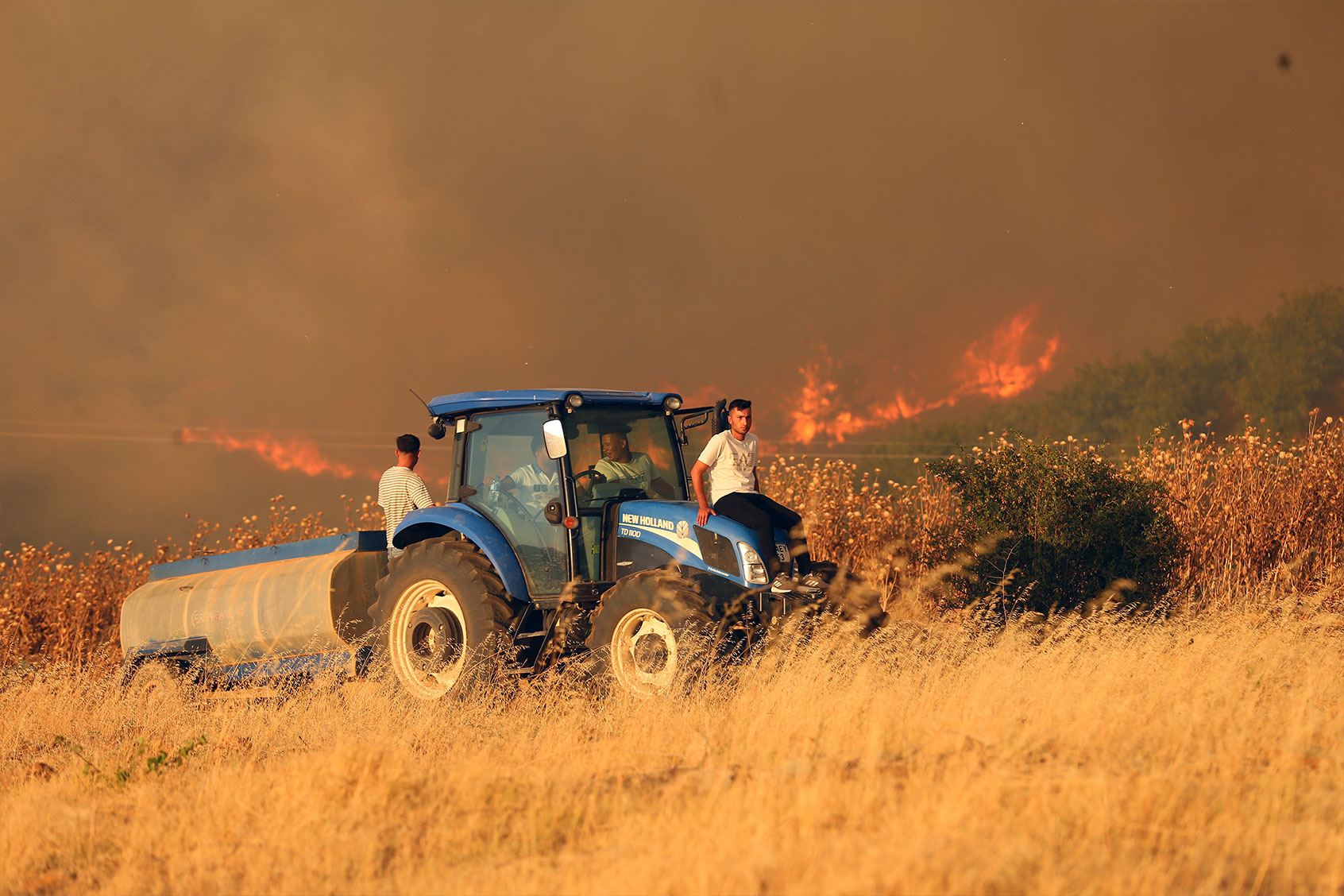 Wildfire continues as aerial and ground firefighting teams try to extinguish the fire that broke out Salihli and Golmarmara districts of Manisa, Turkiye on August 17, 2024. (Ahmet Bayram/Anadolu via Getty Images)