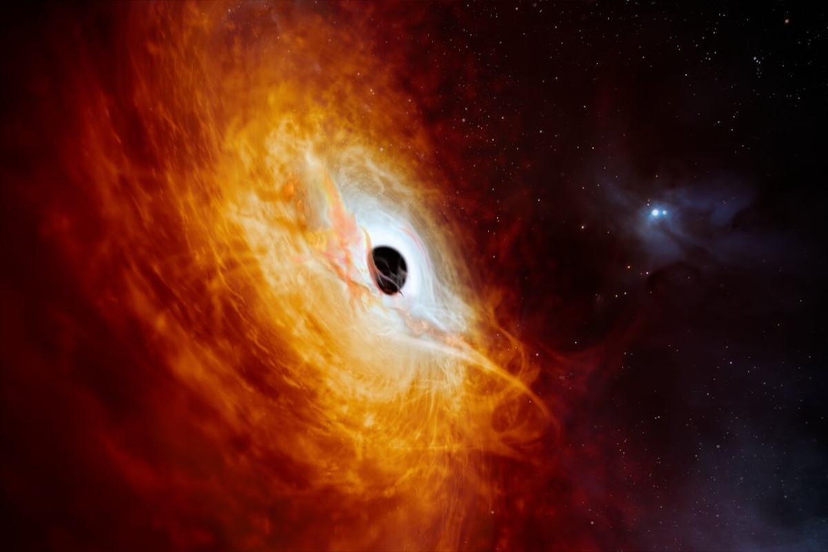 The black hole in this record-breaking quasar is growing in mass by the equivalent of one Sun per day, making it the fastest-growing black hole to date. (European Southern Observatory)