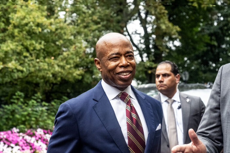 New York City Mayor Eric Adams stands with his lawyer Alex Spiro (R) who delivered remarks to the press on September 26, 2024 in New York City. (Stephanie Keith/Getty Images)