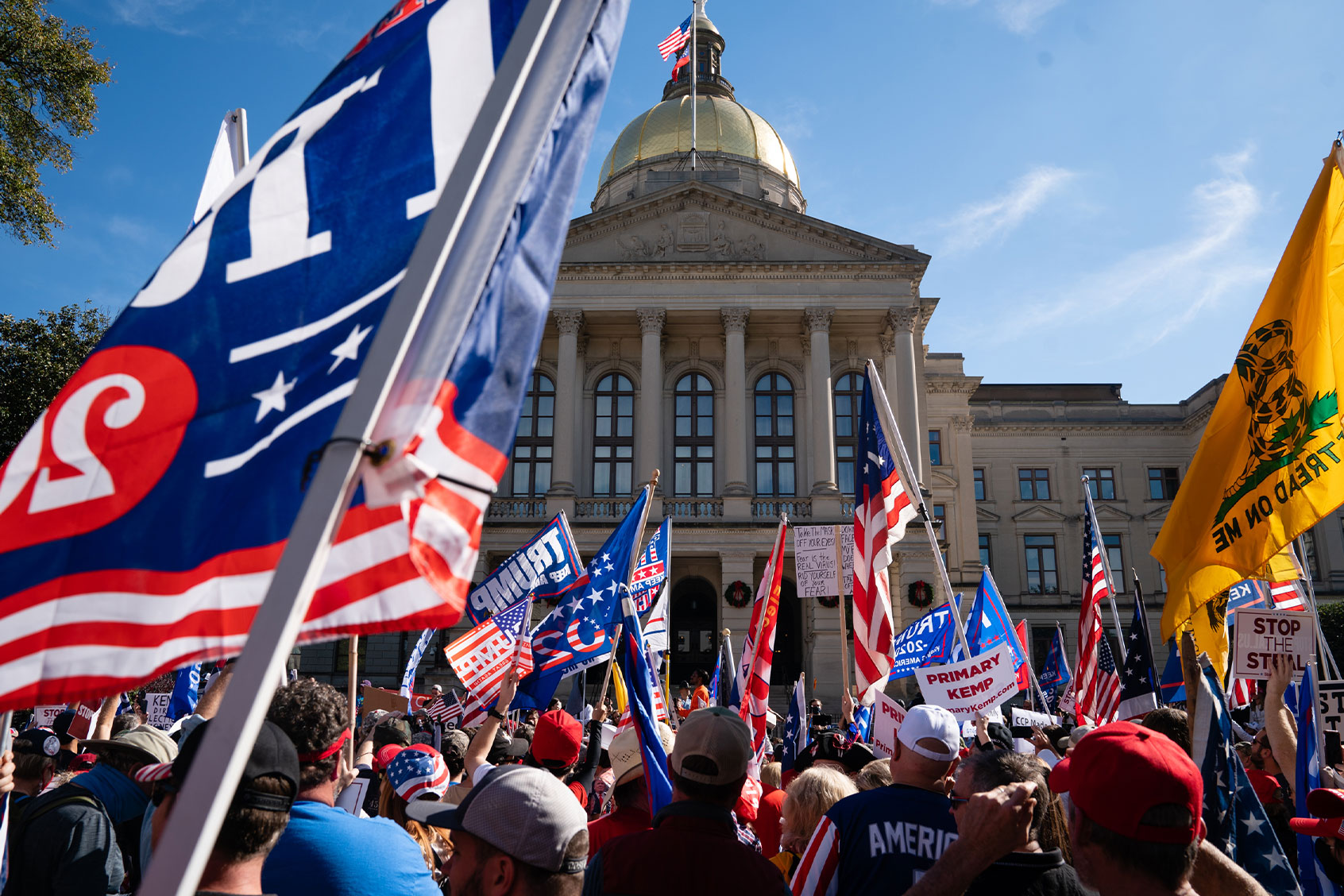 Protesters rally outside the Georgia State Capitol during a 'March for Trump' protest against the results of the 2020 Presidential election on November 21, 2020 in Atlanta, Georgia. (Elijah Nouvelage/Getty Images)