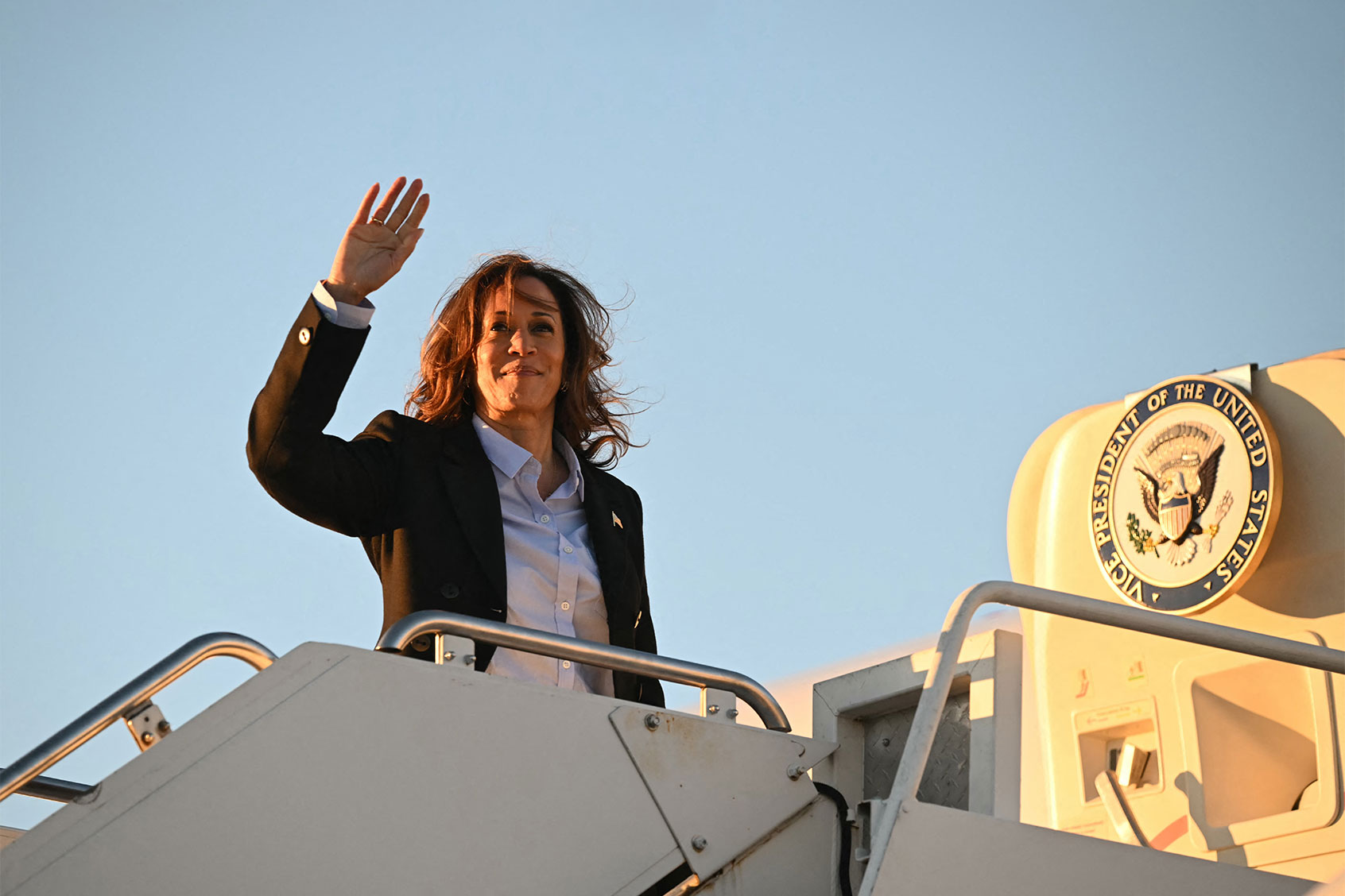 US Vice President and Democratic presidential candidate Kamala Harris waves as she boards Air Force Two departing Pittsburgh International Airport in Pittsburgh, Pennsylvania on September 2, 2024. (ANDREW CABALLERO-REYNOLDS/AFP via Getty Images)