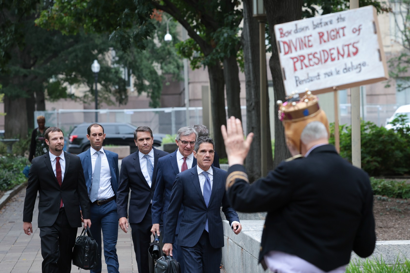 Attorneys for former U.S. President Donald Trump Todd Blanche (C), John Lauro (R) and Gregory Singer (L) arrive at the E. Barrett Prettyman U.S. Court House August 28, 2023 in Washington, DC. (Win McNamee/Getty Images)
