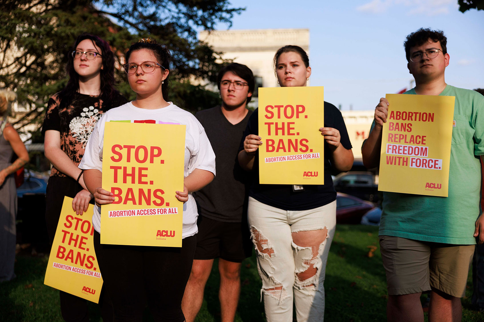 Abortion rights activists gather at the Monroe County Courthouse for a protest vigil a few hours before Indianas near total abortion ban goes into effect in Bloomington. (Jeremy Hogan/SOPA Images/LightRocket via Getty Images)