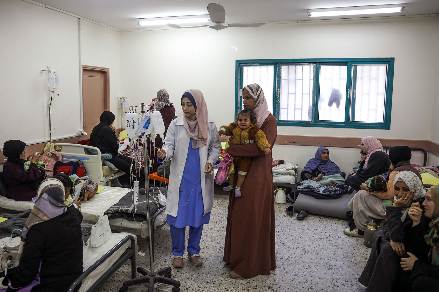 Palestinian women and infants displaced Rafah Gaza