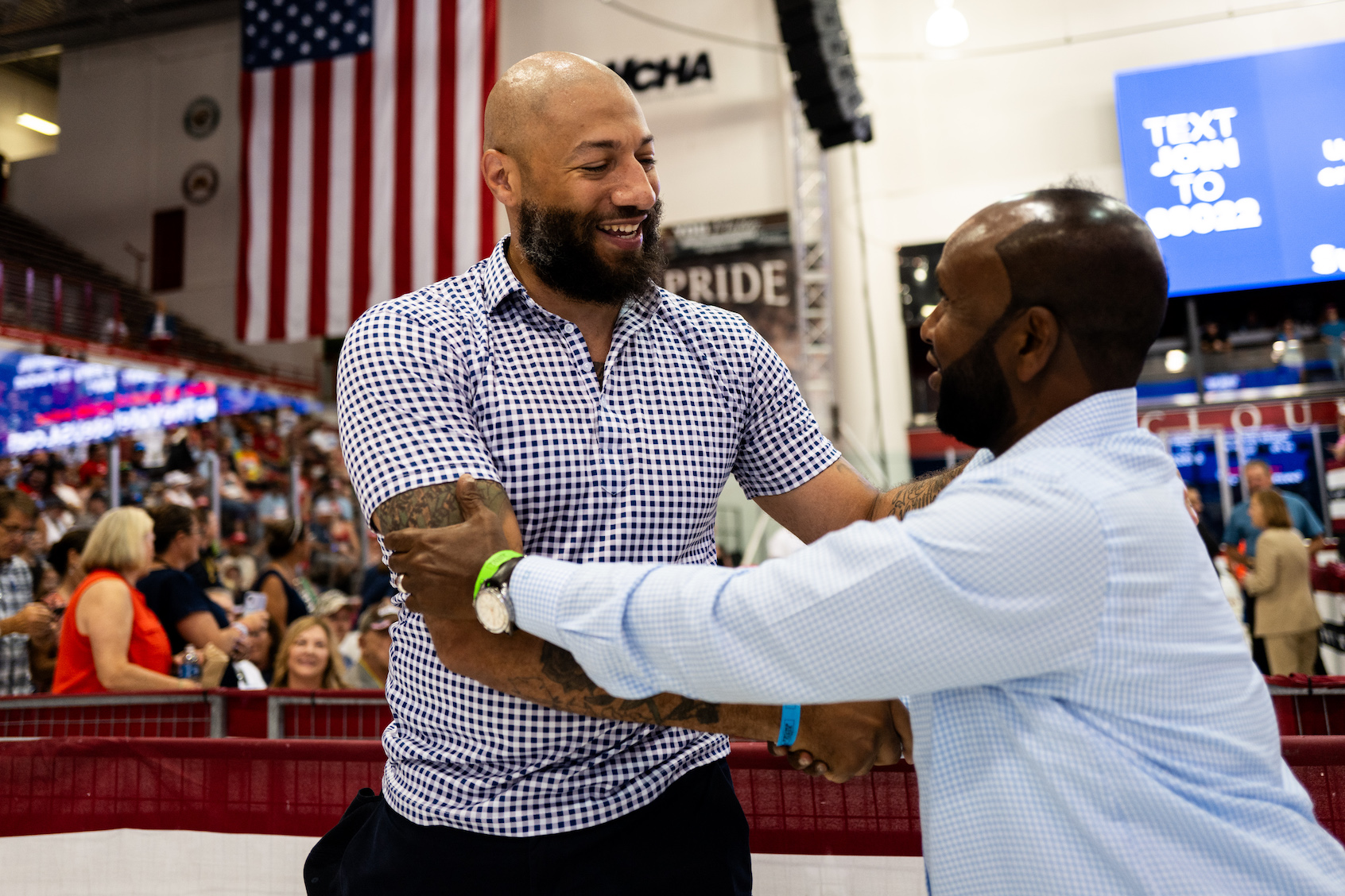 Republican candidate for Senate Royce White (L) greets attendees before a rally featuring U.S. Republican Presidential nominee former President Donald Trump and Republican vice presidential nominee U.S. Sen. J.D. Vance (R-OH) at Herb Brooks National Hockey Center on July 27, 2024 in St Cloud, Minnesota. Trump hopes to flip the state of Minnesota this November, which hasn't been carried by a Republican in a presidential election since 1972. (Photo by Stephen Maturen/Getty Images)