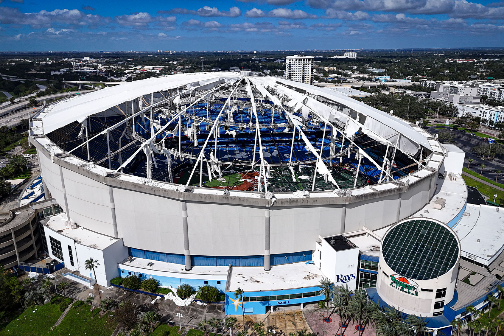 A drone image shows the dome of Tropicana Field which has been torn open due to Hurricane Milton in St. Petersburg, Florida, on October 10, 2024. (MIGUEL J. RODRIGUEZ CARRILLO/AFP via Getty Images)