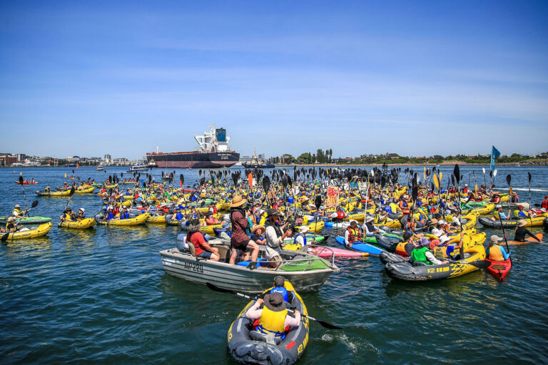 Climate protestors in kayaks continue their attempt to block access to Newcastle coal port during the People's Blockade on November 24, 2024 in Newcastle, Australia. (Roni Bintang/Getty Images)