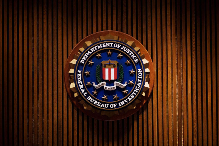 A crest of the Federal Bureau of Investigation is seen inside the J. Edgar Hoover FBI Building in Washington, DC. (MANDEL NGAN/AFP via Getty Images)
