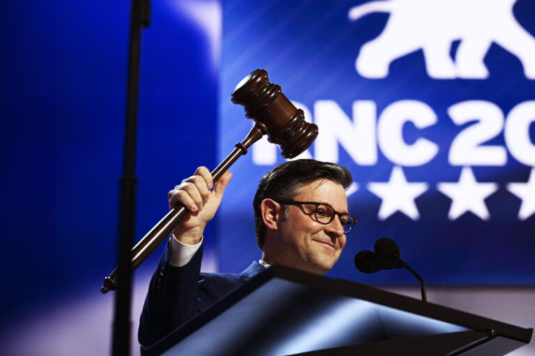 House Speaker Mike Johnson (R-LA) holds the gavel while checking the podium during the first day of the 2024 Republican National Convention at the Fiserv Forum in Milwaukee, Wisconsin, July 15, 2024. (BRENDAN SMIALOWSKI/AFP via Getty Images)