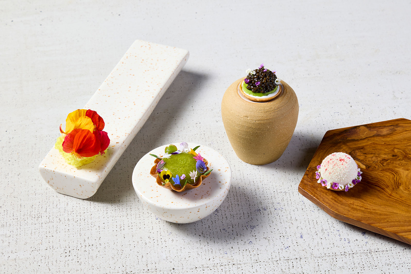 Dhokla Aero, Pani Puri, Tuna Bhel with Caviar and Dahi Puri served at Indienne