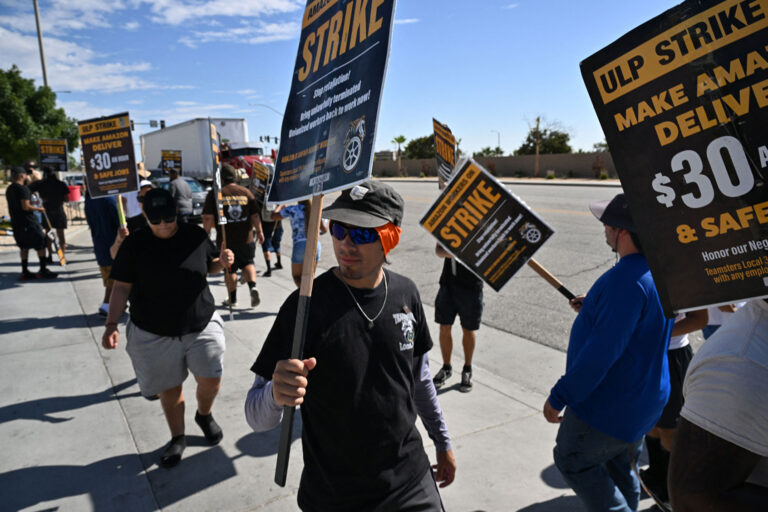 Amazon delivery drivers and dispatchers strike at the company's Palmdale, California, warehouse and delivery center on July 25, 2023. (ROBYN BECK/AFP via Getty Images)