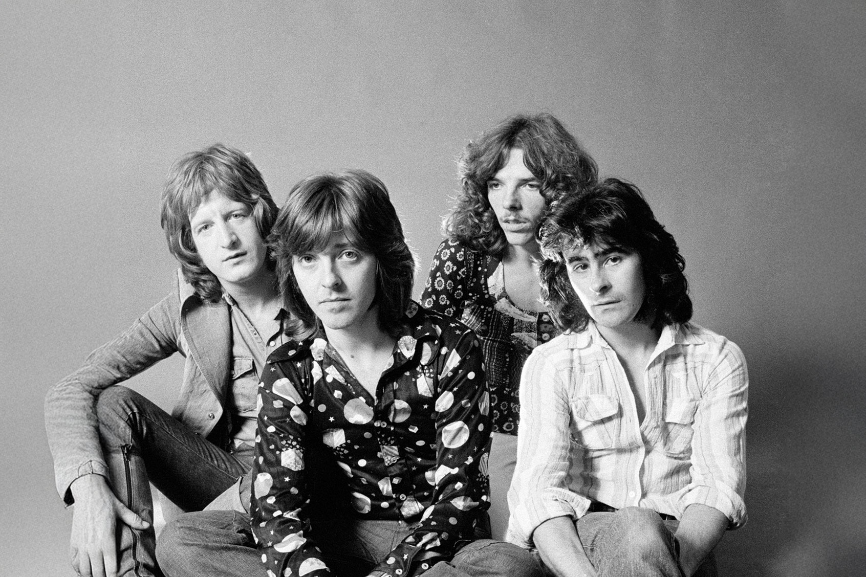 British rock group Badfinger, September 1973. Left to right: singer/guitarist Pete Ham (1947 - 1975), guitarist Joey Molland, drummer Mike Gibbins and bassist Tom Evans. (Michael Putland/Getty Images)