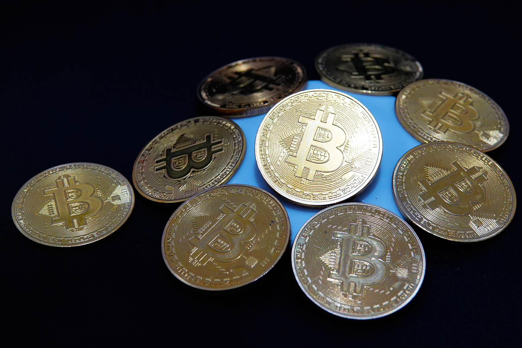 Commemorative bitcoin coins (Costfoto/NurPhoto via Getty Images)