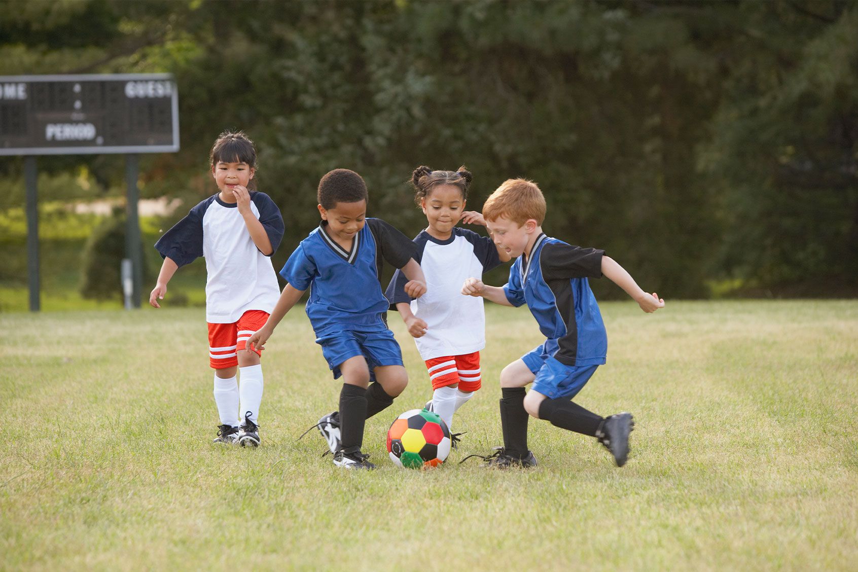 Children playing soccer (Getty Images/Ariel Skelley)