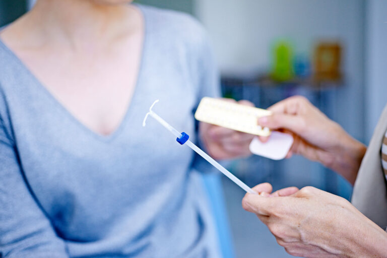 Doctor discussing contraceptive methods with a patient (BSIP/Universal Images Group via Getty Images)