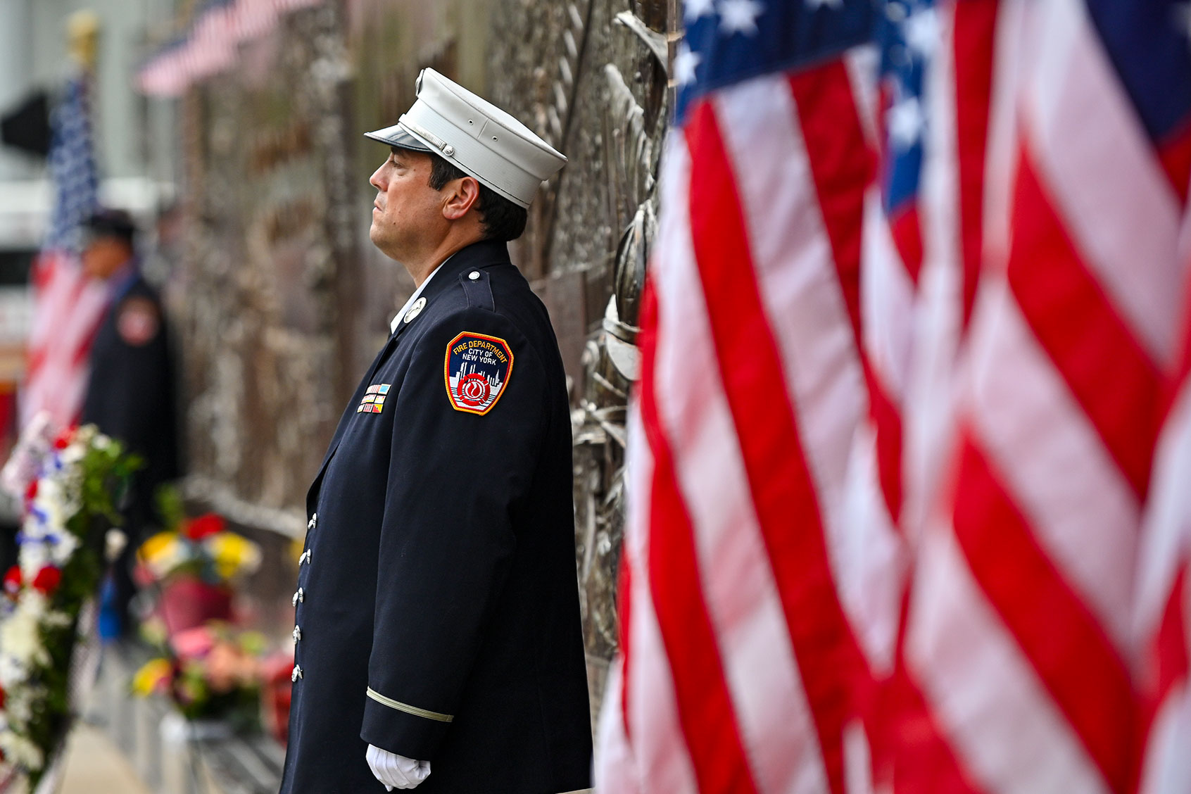 Fire fighters attend a ceremony near the 9/11 memorial on September 11, 2023 in New York City. (Miguel J. Rodríguez Carrillo/VIEWpress/Getty Images)