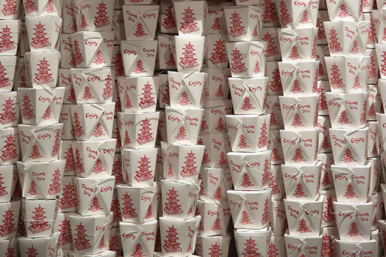 The wall of paper take-out containers at the Museum of Food and Drink (MOFAD) in New York. (Monica Schipper/Getty Images for Cooking Light)