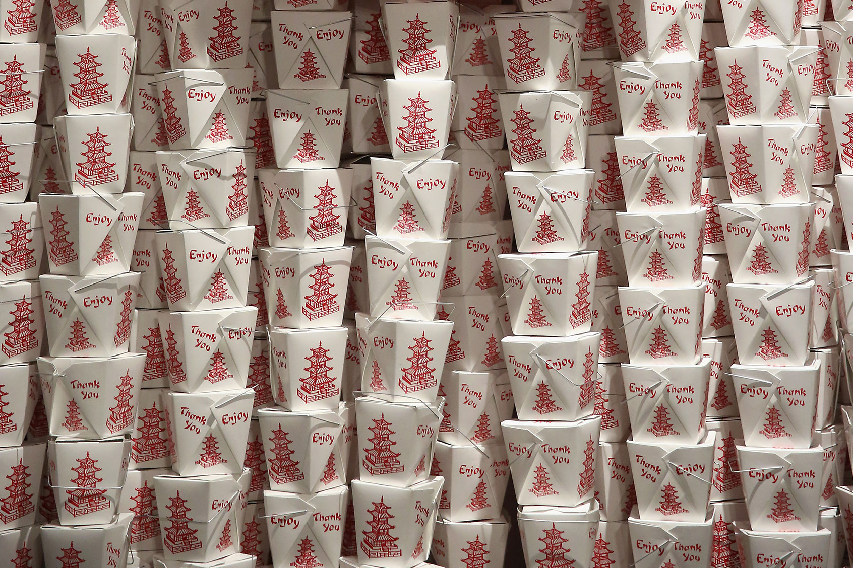 The wall of paper take-out containers at the Museum of Food and Drink (MOFAD) in New York. (Monica Schipper/Getty Images for Cooking Light)