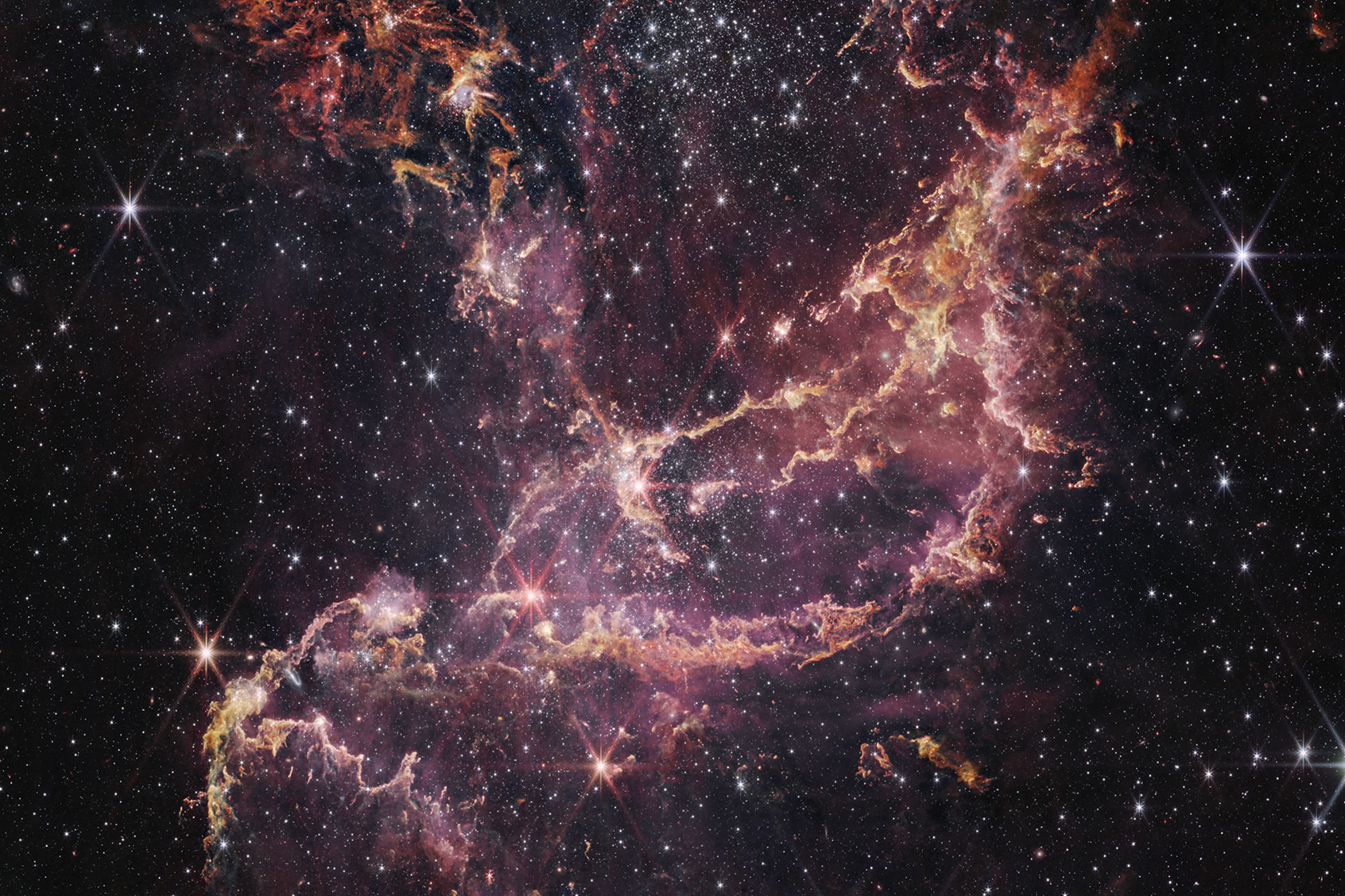 This image of the star cluster NGC 346, captured by Webb's Near-Infrared Camera. (NASA, ESA, CSA, STScI, Olivia C. Jones (UK ATC), Guido De Marchi (ESTEC), Margaret Meixner (USRA))